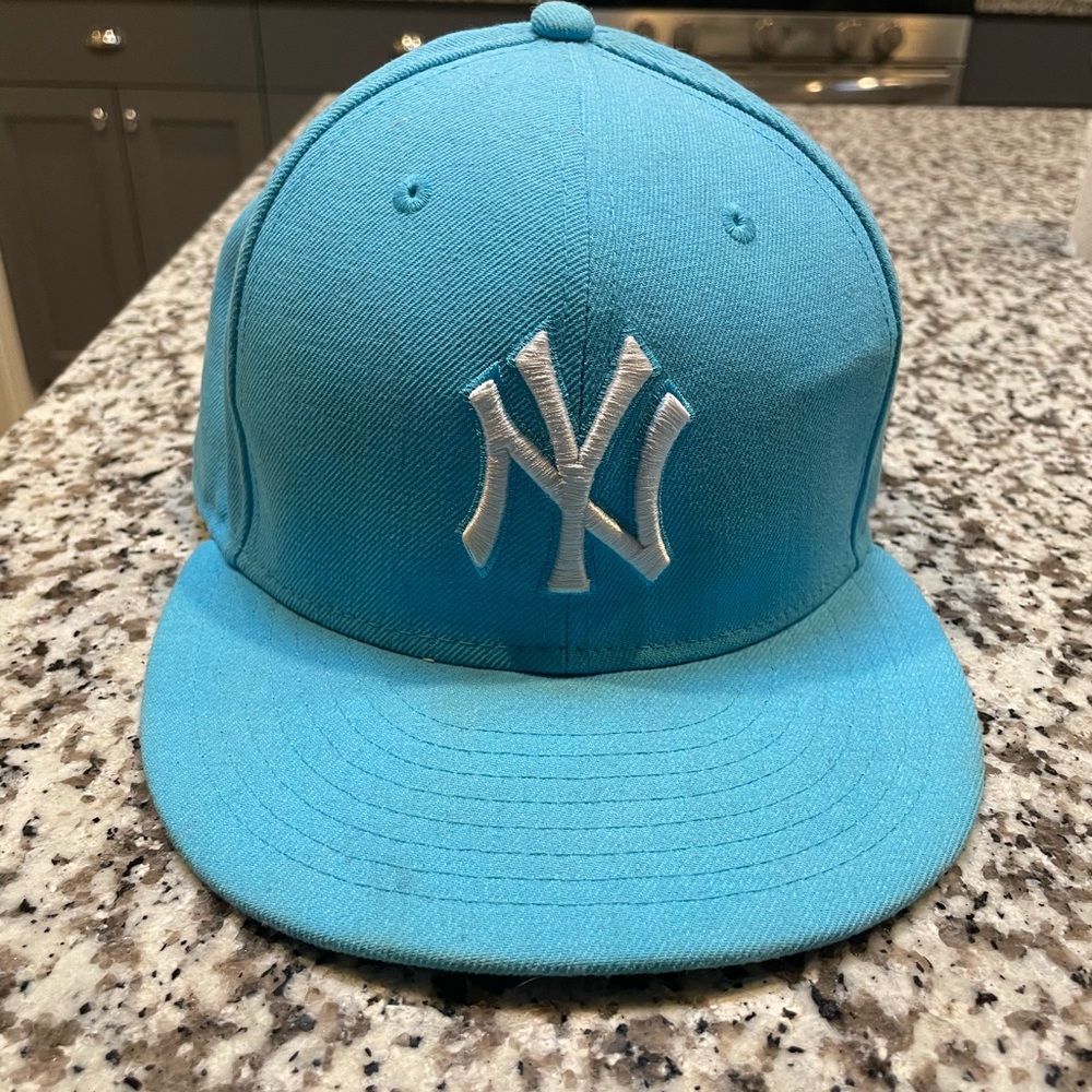 NY Yankee fitted hat.